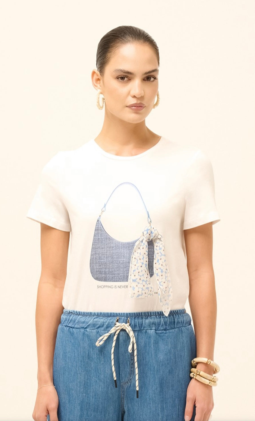 T-shirt con dettaglio borsa