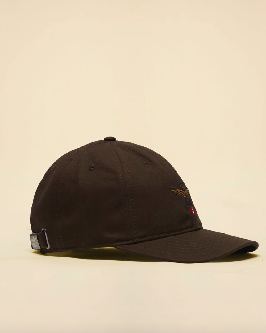 Cappellino con ricamo aquila turrita